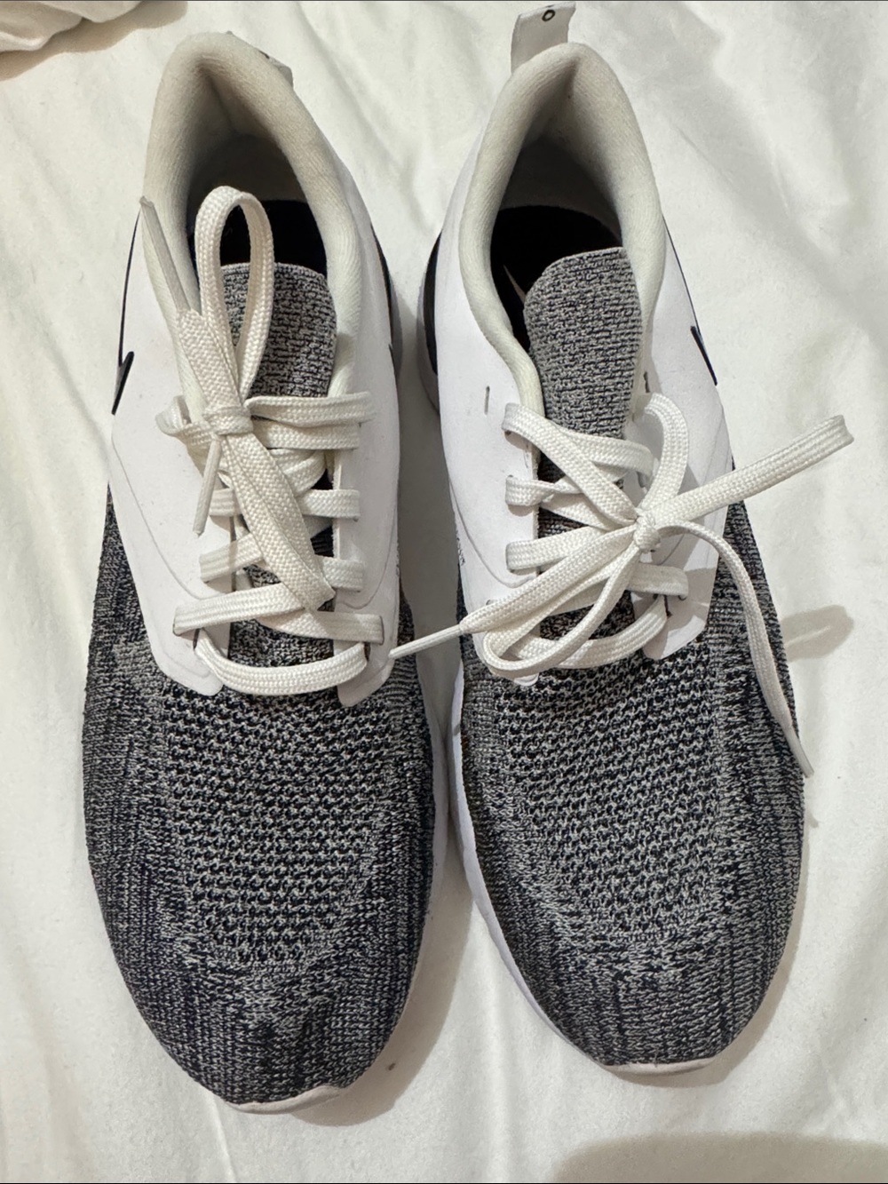 Nike Women’s Odyssey React Flyknit Running Sneakers in White and Gray